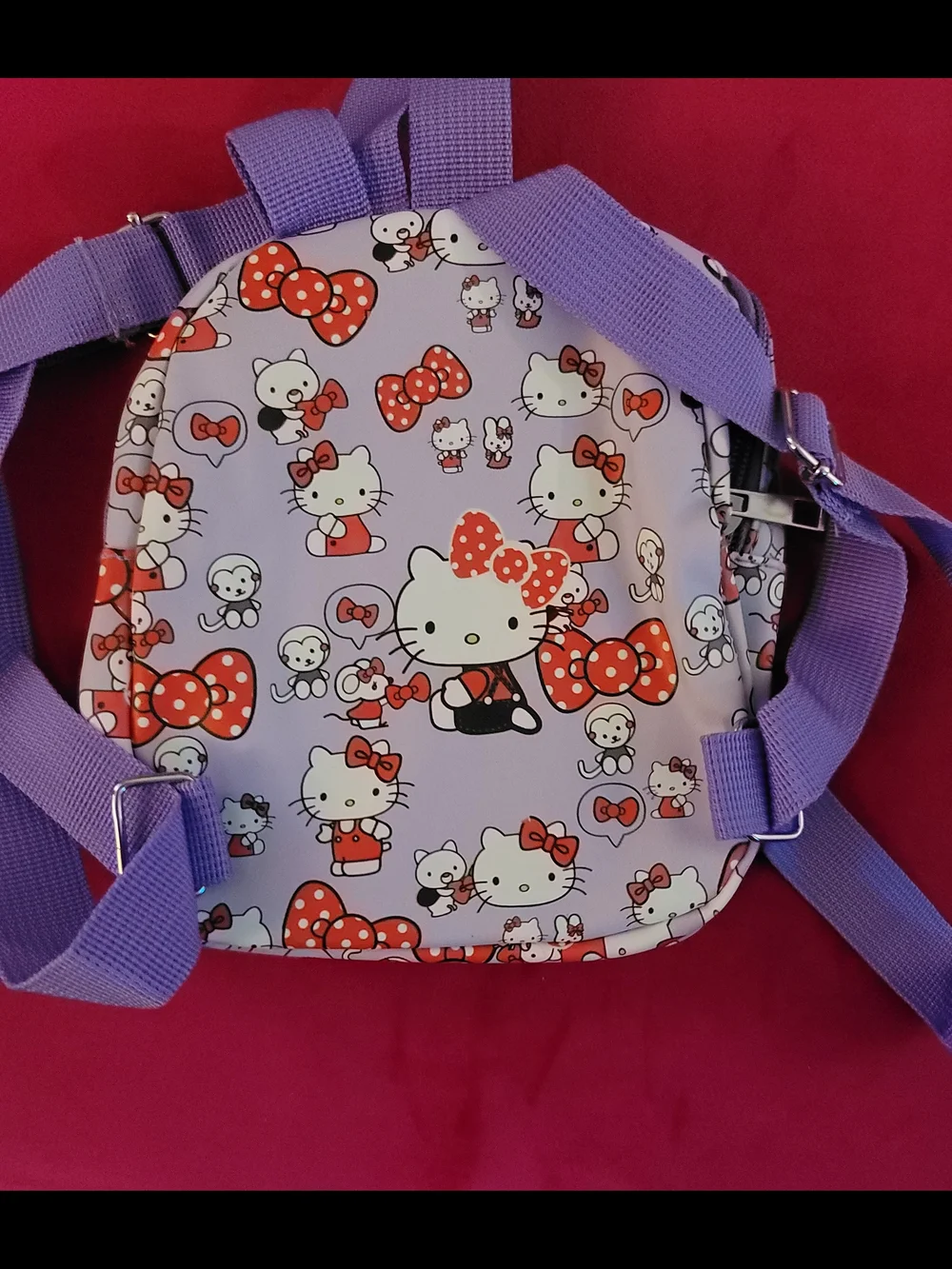 Hello Kitty Lavender Mini Backpack with Red Bow Pattern
